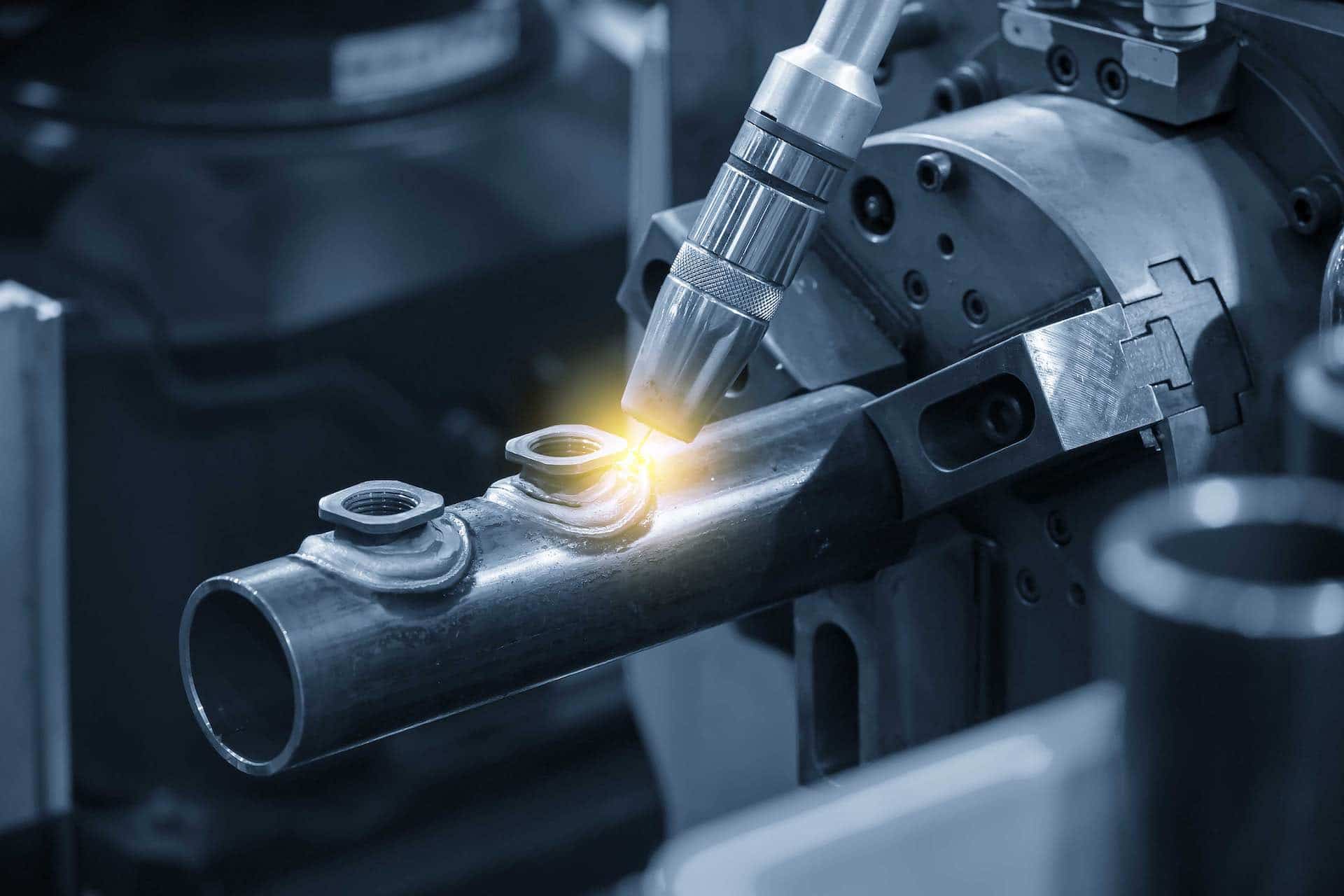 The abstract scene of robotic arm welding machine . The hi technology automotive parts manufacturing process by robotic system for electric welding machine. smeup soluzioni settore metalmeccanico